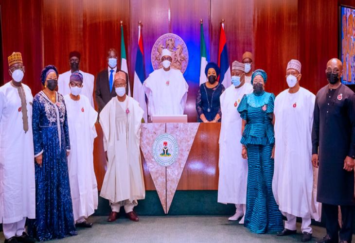 President Buhari flanked by L-R: NNPC CEO Mele Kyari, Minister of State Petroleum Timpre Sylva, NNPC Board Chairman Margery Chuba Okadigbo, NNPC CFO Umar Ajiya, and other members of the board during the inauguration of the Board of Directors of Nigeria National Petroleum Company (NNPC) in State House on 7th Jan. 2022