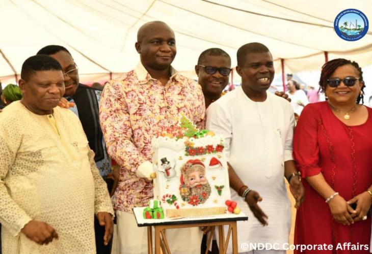 Photo Caption:  The NDDC Managing Director, Dr Samuel Ogbuku, (2nd left) cutting the cake  during the Annual Thanksgiving Service organised by the NDDC Christian Fellowship at the Commission’s headquarters in Port Harcourt.   First left is the fellowship&#039;s resident pastor, Mr. Udoma Sunday, while from the  right is the Director Commercial and Industrial Development (Skills Development), Barr. Lyna Okara and the Director, Administration and Human  Resources, Mr. Patrick Ekade.